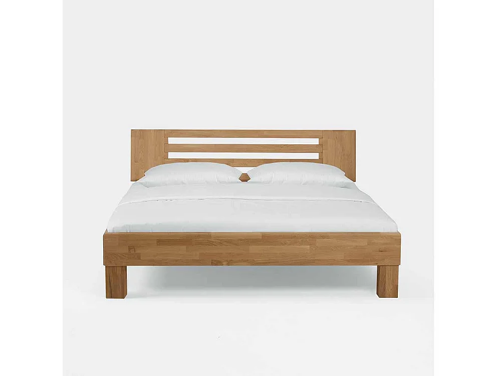 Massivholzbett aus Wildeiche honigfarben geölt mit überlänge