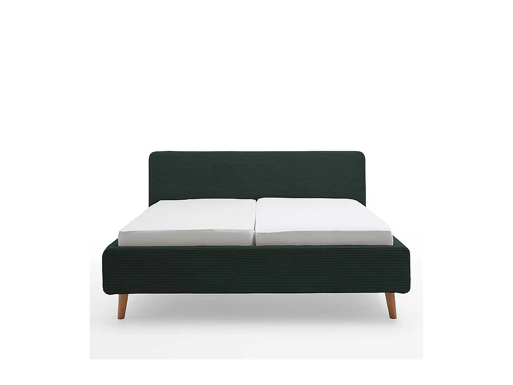 Dunkelgrünes Polsterbett mit Cordbezug Vierfußgestell aus Holz