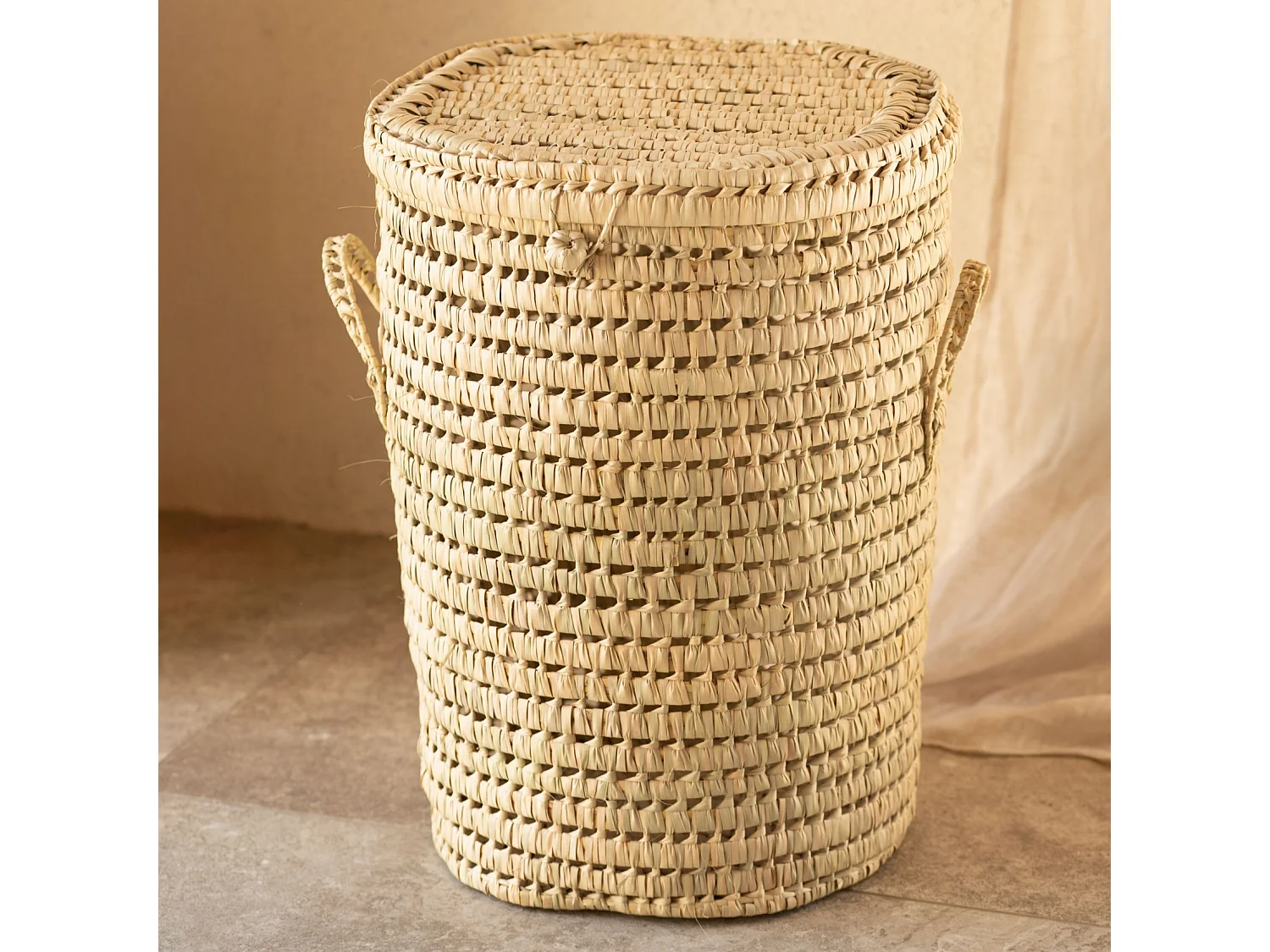 Cesta de ropa redonda con diseño de palma