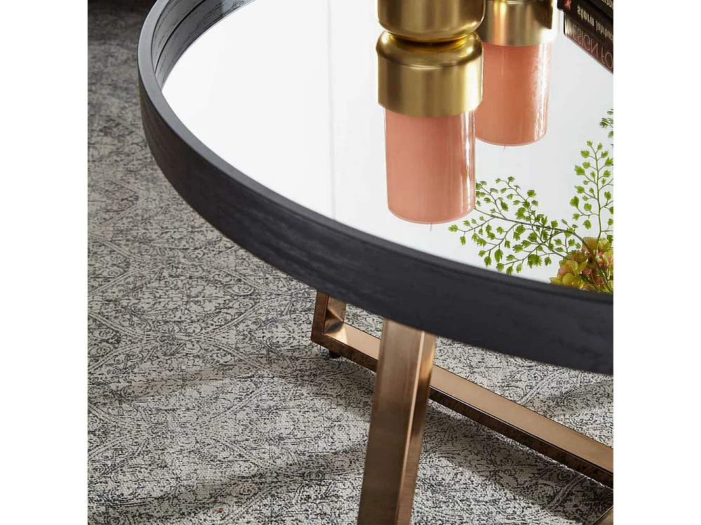 Salontisch in Schwarz und Altgoldfarben runder Spiegelglas Platte