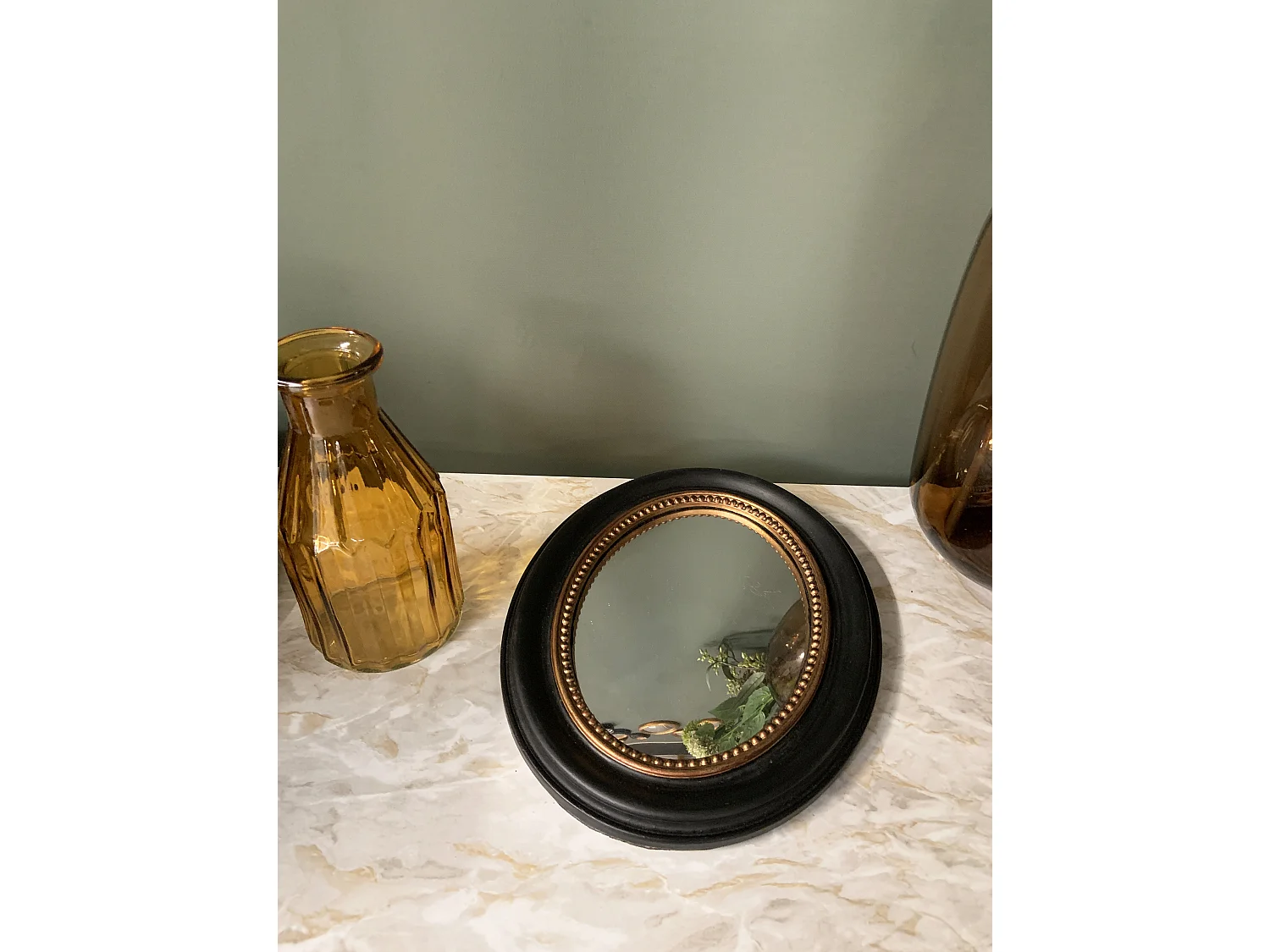 Miroir convexe ovale noir et doré 24x19cm