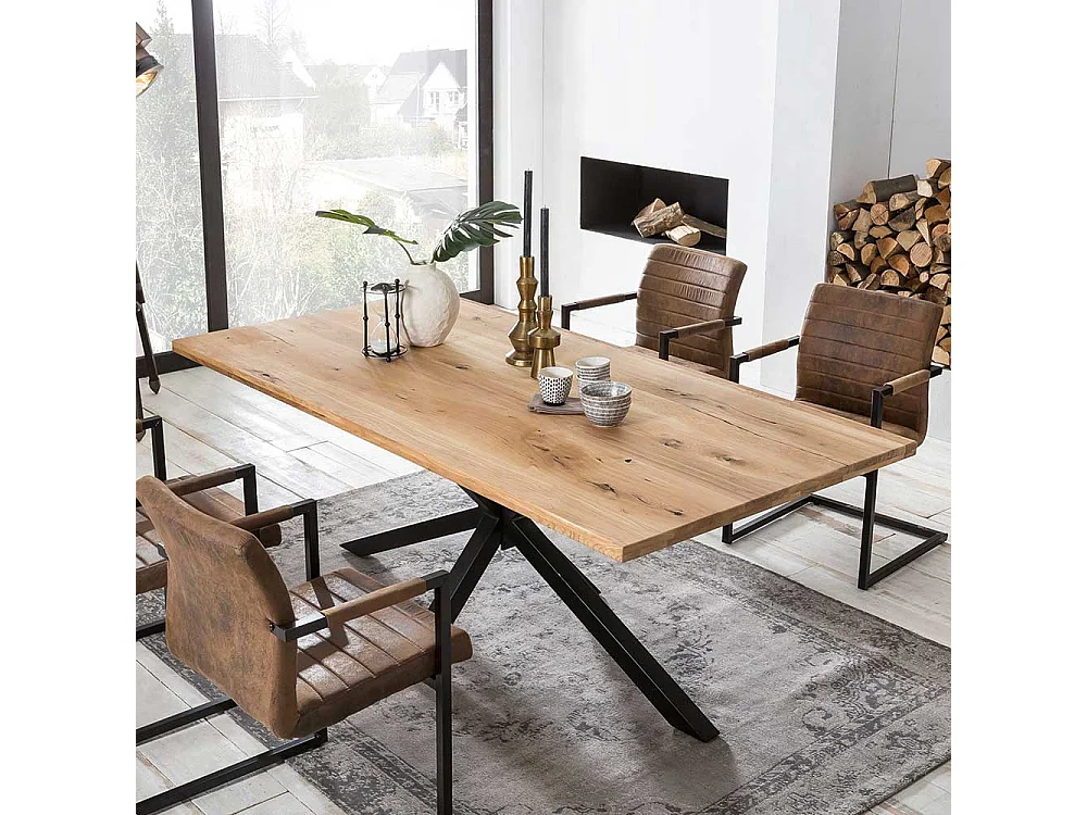 Esszimmertisch aus Wildeiche Massivholz und Eisen Spider Gestell