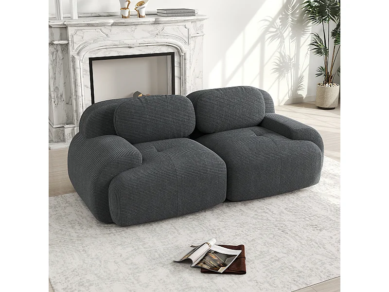 2-zitsbank met gebogen armleuningen en gewatteerde rugleuning, grijze ribfluweel