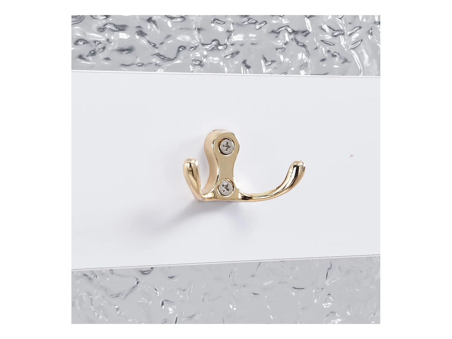 Porte-manteau blanc avec 2 portes et 1 tiroir de rangement, poignées et pieds dorés