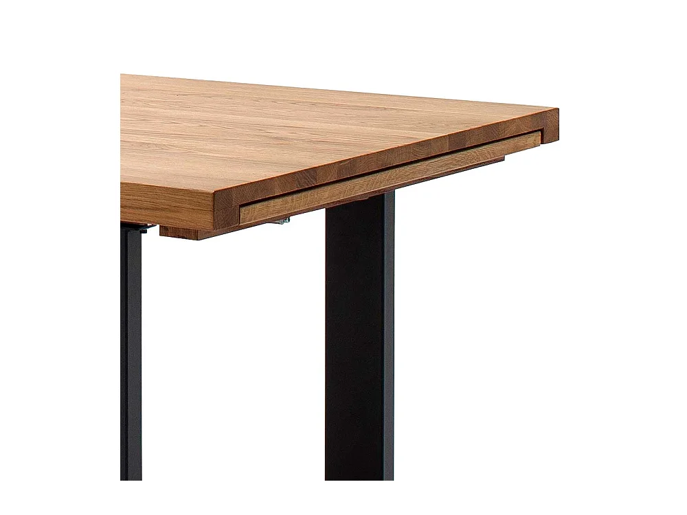 Ausziehtisch aus Wildeiche Massivholz Bügelgestell in Schwarz