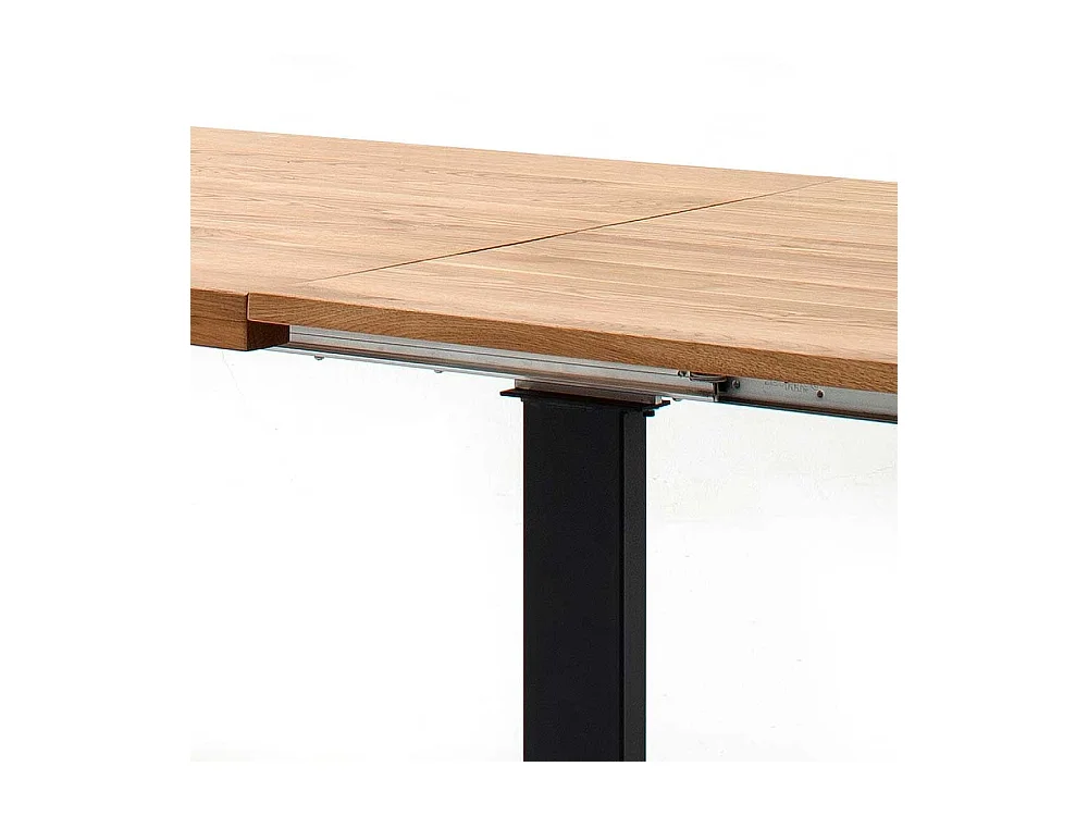 Ausziehtisch aus Wildeiche Massivholz Bügelgestell in Schwarz