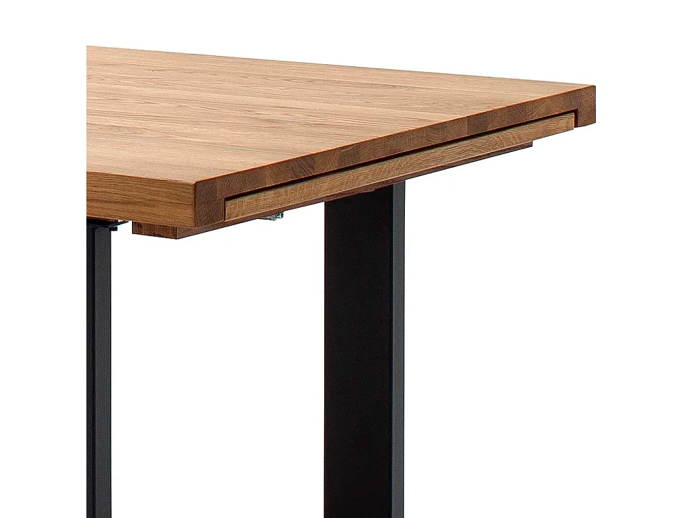 Ausziehtisch aus Wildeiche Massivholz Bügelgestell in Schwarz