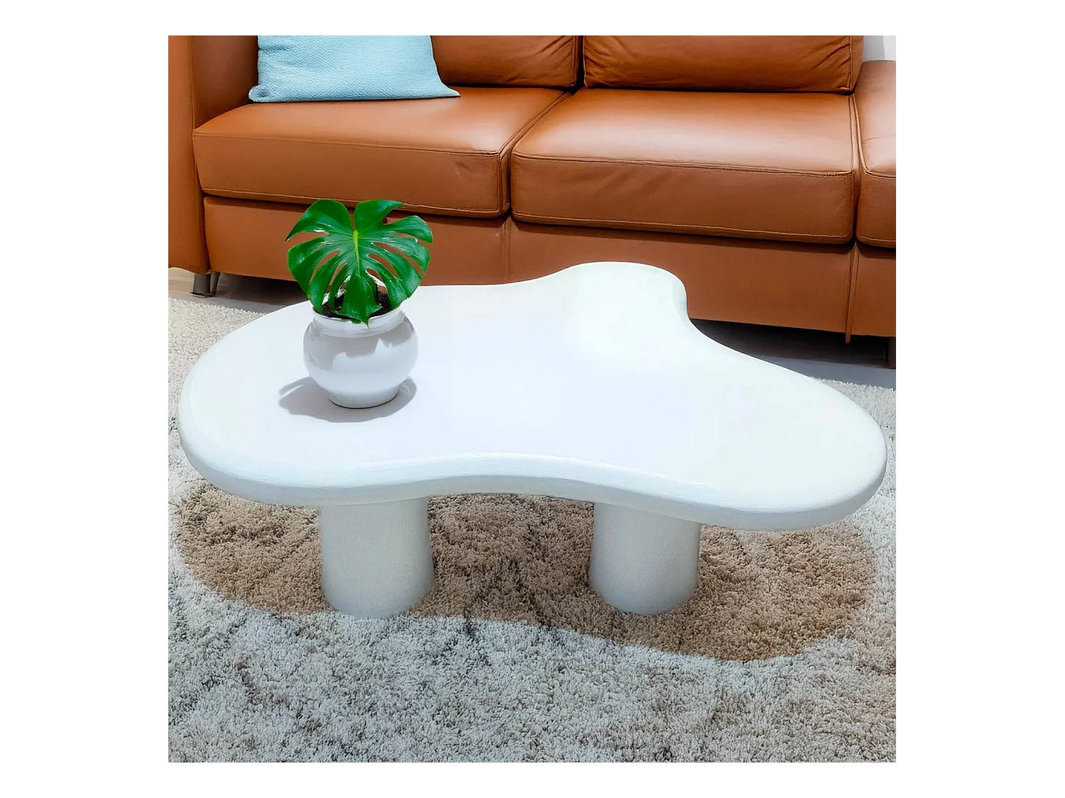 Table basse forme courbes naturelles Valdo 69x100cm Blanc texturé