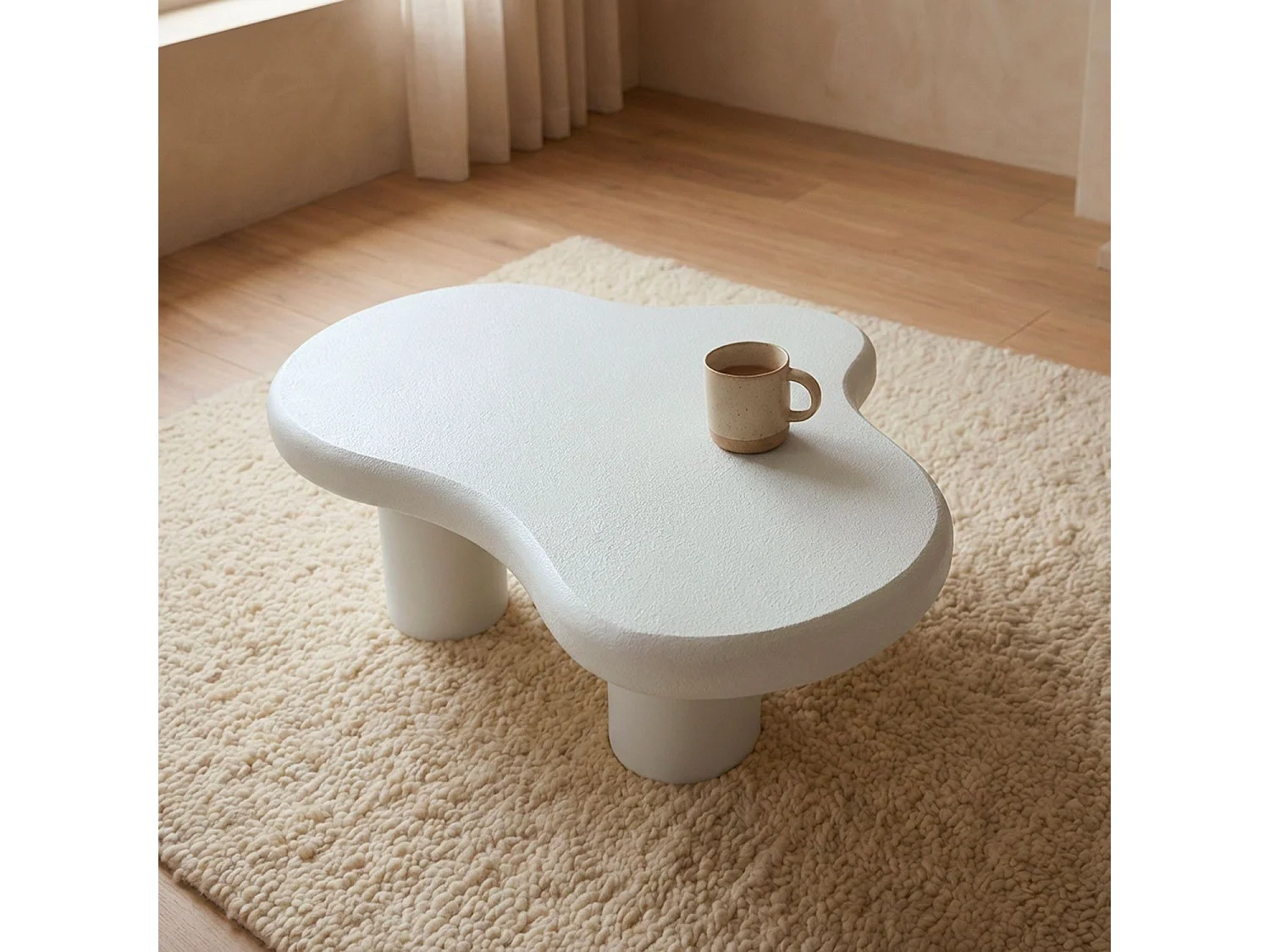 Table basse forme courbes naturelles Valdo 69x100cm Blanc texturé