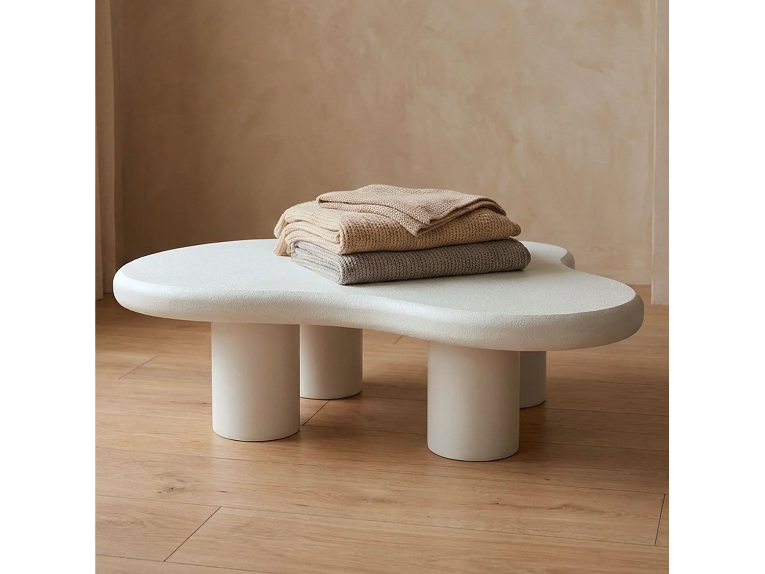 Table basse forme courbes naturelles Valdo 69x100cm Blanc texturé