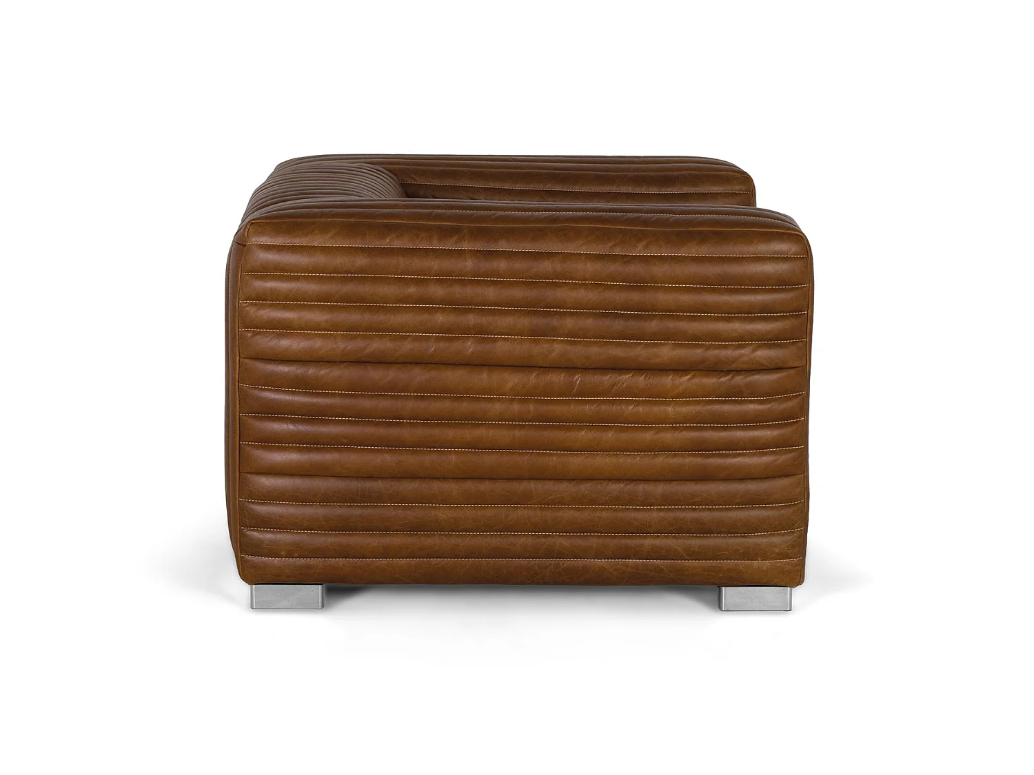 Fauteuil rembourré en cuir de forme cubique et pieds en acier