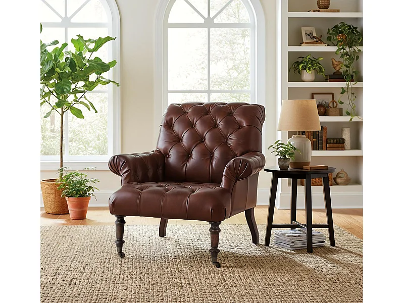 Met leer beklede fauteuil met gecapitonneerde armleuningen