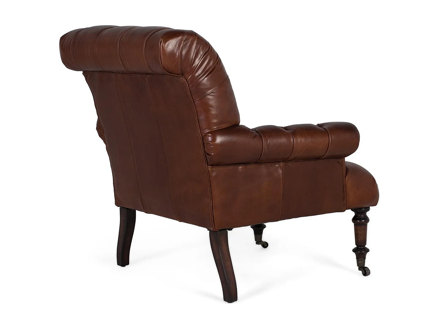 Sillón tapizado en cuero con reposabrazos acabado en capitoné