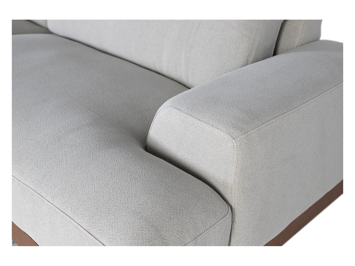 Canapé 4 places recouvert de tissu en lin gris et pieds en métal