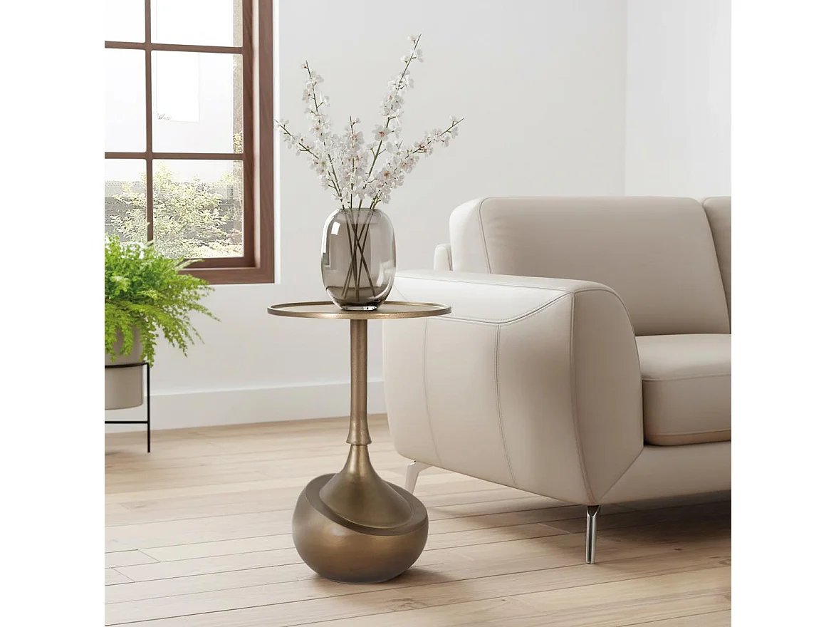 Table basse en métal avec finition bronze