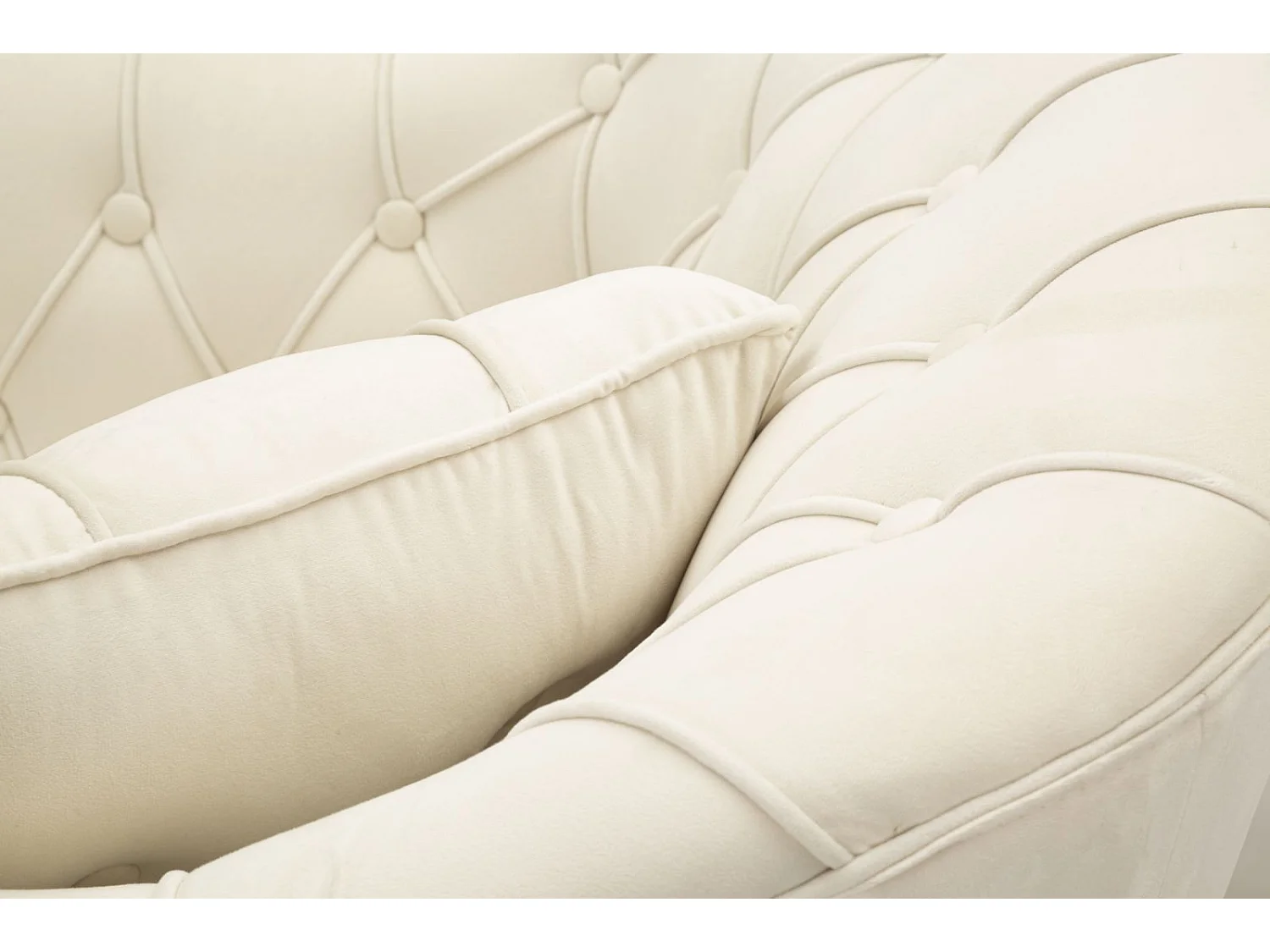 Poltrona in tessuto e metallo color crema con cuscino