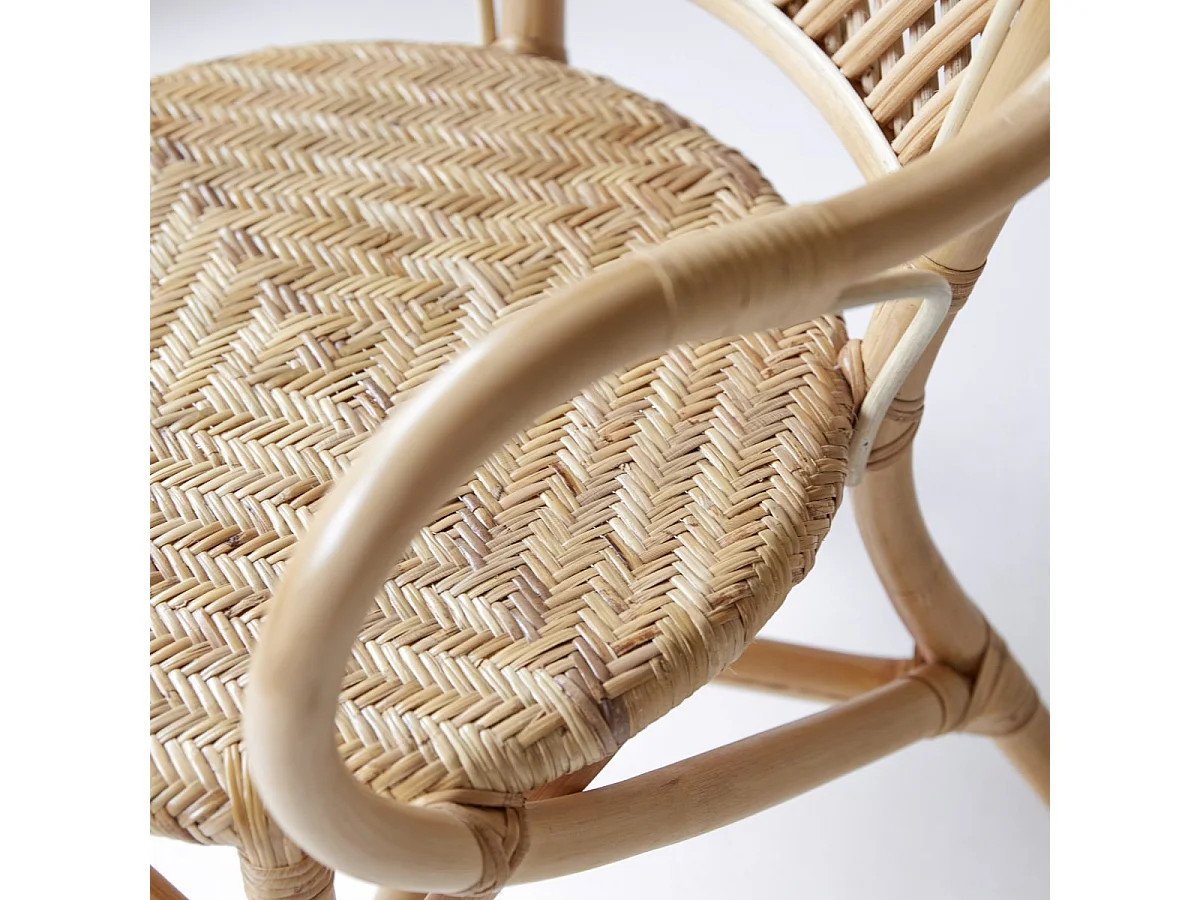 Poltrona in steli di rattan Marius
