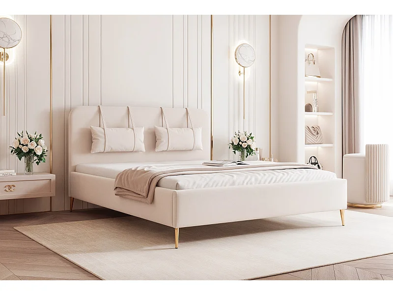 BESILIO Lit sur pieds dorés 180x200 Monti II – lit fin avec coussins décoratifs amovibles, pieds en métal, sommier et coffre de rangement – Crème