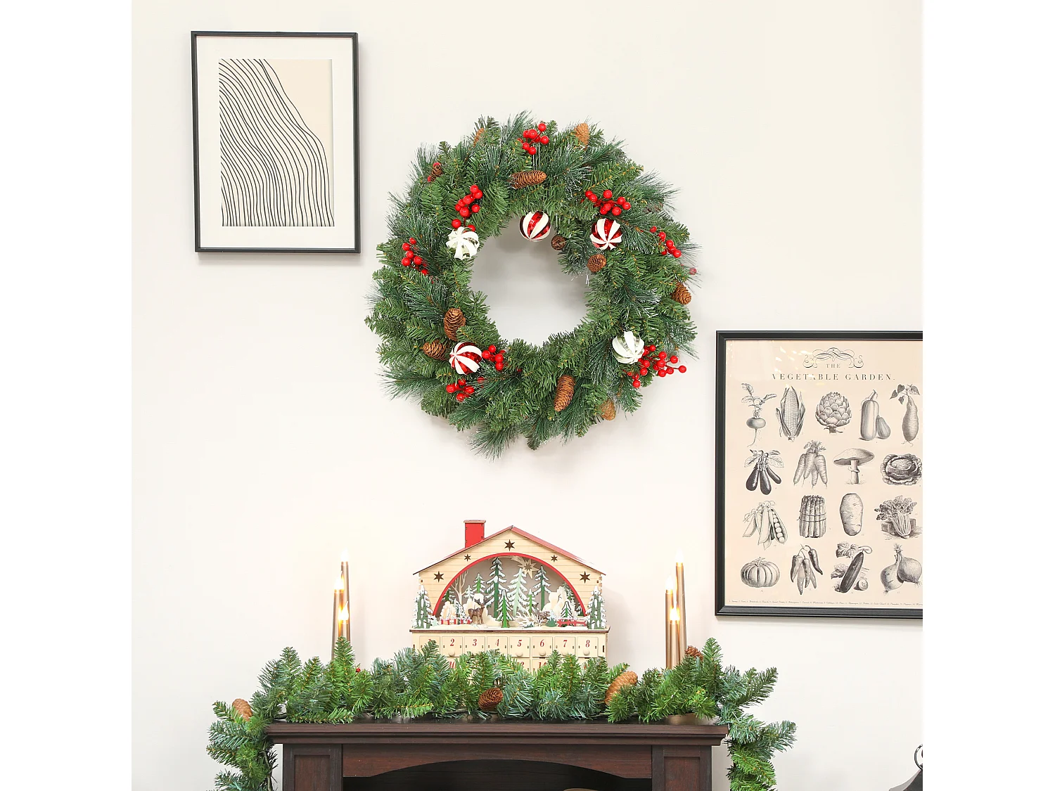 Ghirlanda natalizia da 60 cm innevata con pigne bacche e palline