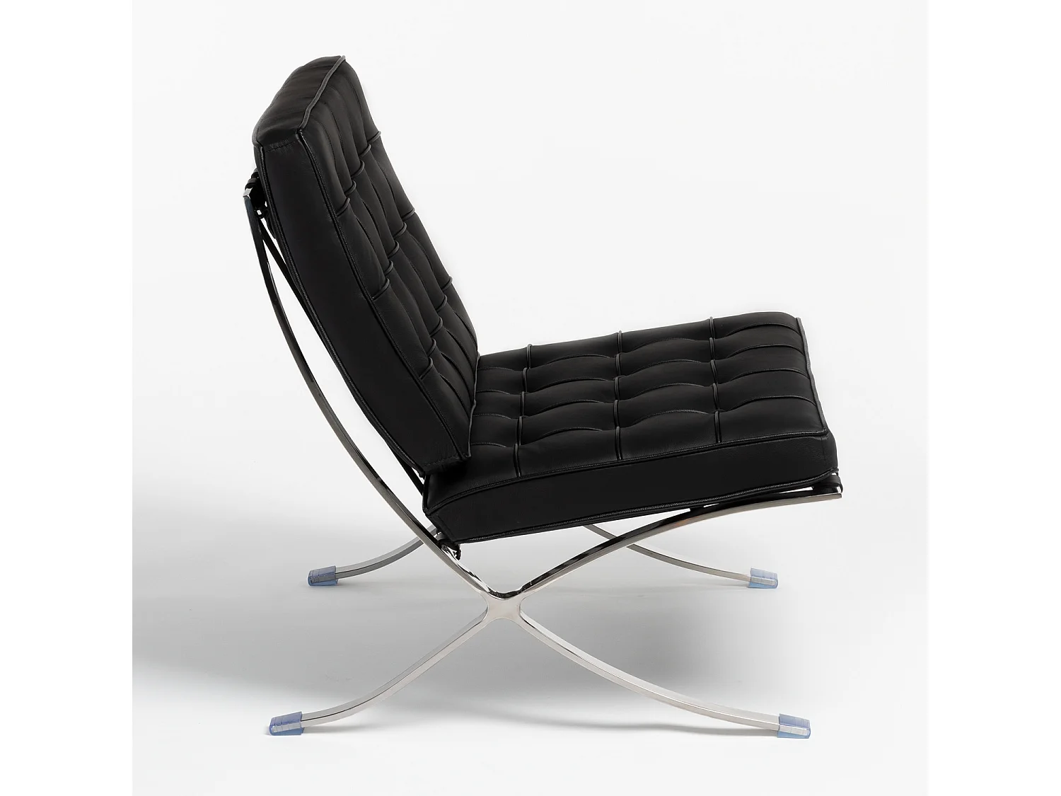 Fauteuil capitonné cuir noir Barka