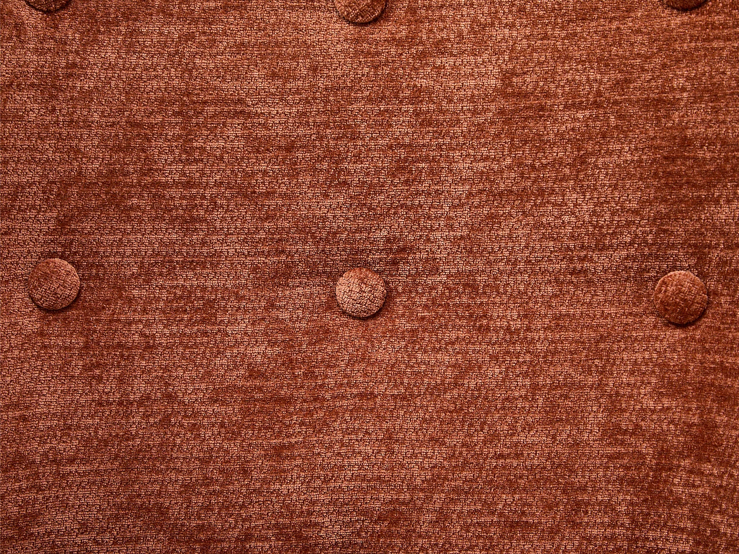 Fauteuil à bascule en tissu texturé terracotta ELMINA