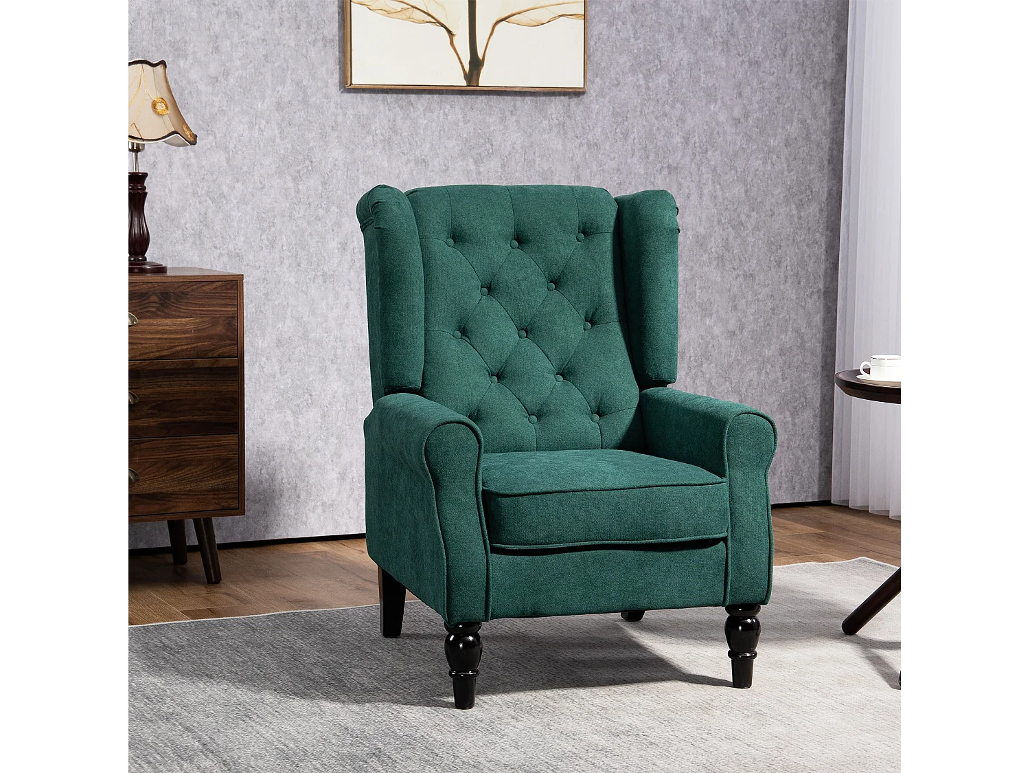 Fauteuil à oreilles style Chesterfield dossier capitonné grand confort bois noir tissu vert