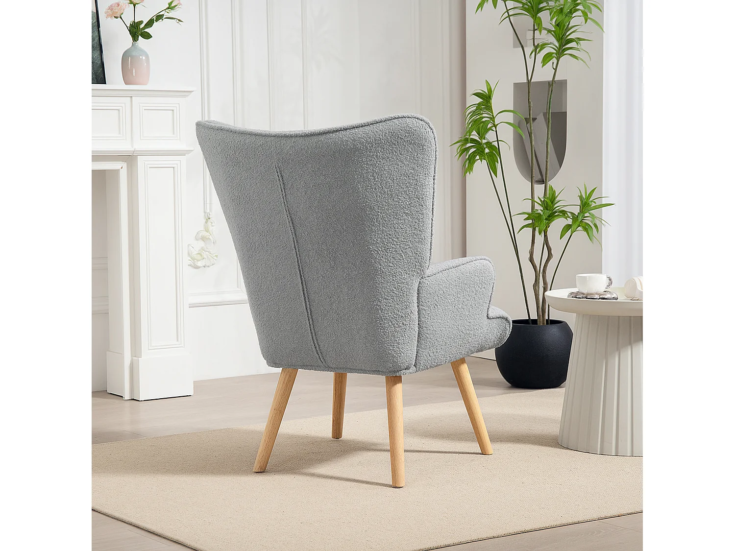 Fauteuil à oreilles style nordique piètement bois effet laine bouclée gris