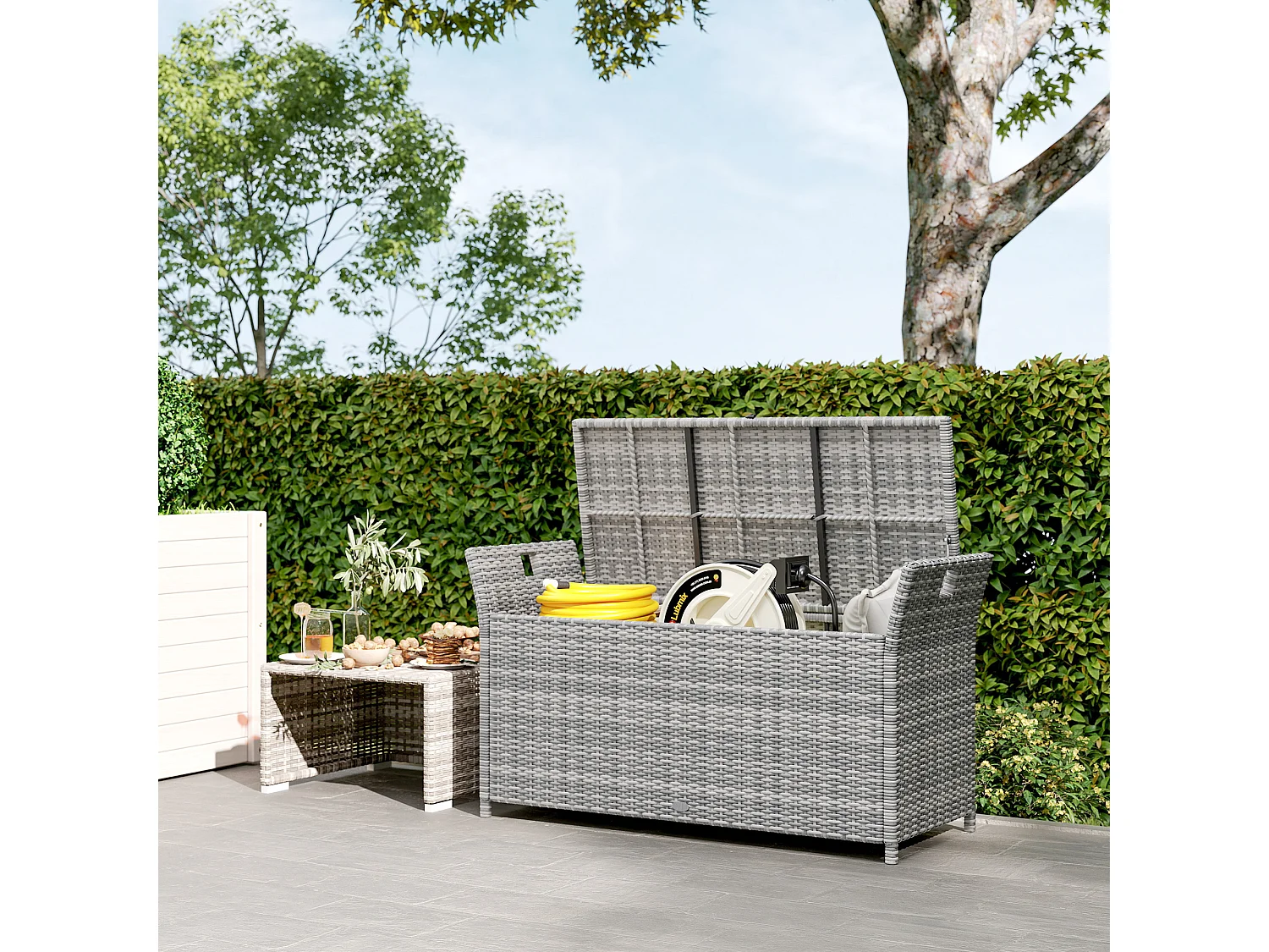 Coffre de jardin en résine tressée avec poignées et coussin déhoussable dim. 125 x 55 x 70 cm gris