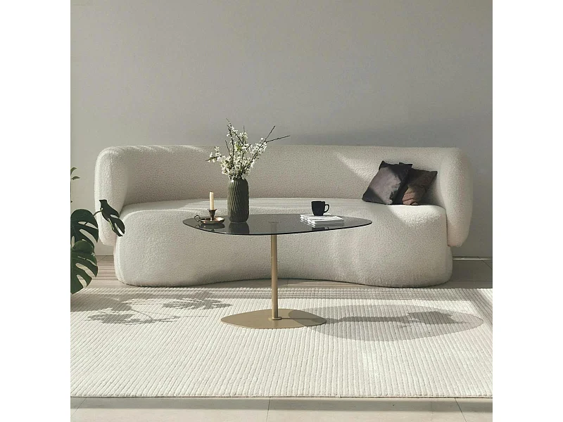 Table basse verre fumé minimaliste, galet et pied doré TULUM