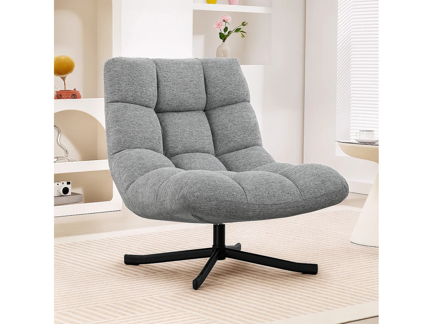 Fauteuil lounge style Chesterfield grand confort pivotant piètement acier croisé noir tissu chenille gris