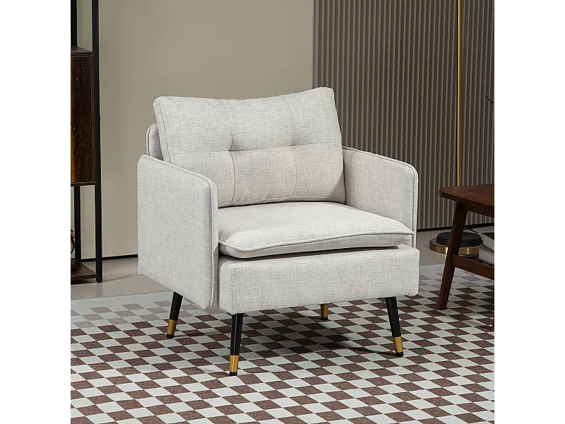 Fauteuil style art-déco dossier effet capitonné piètement incliné effilé métal noir extrémités dorées tissu blanc cassé