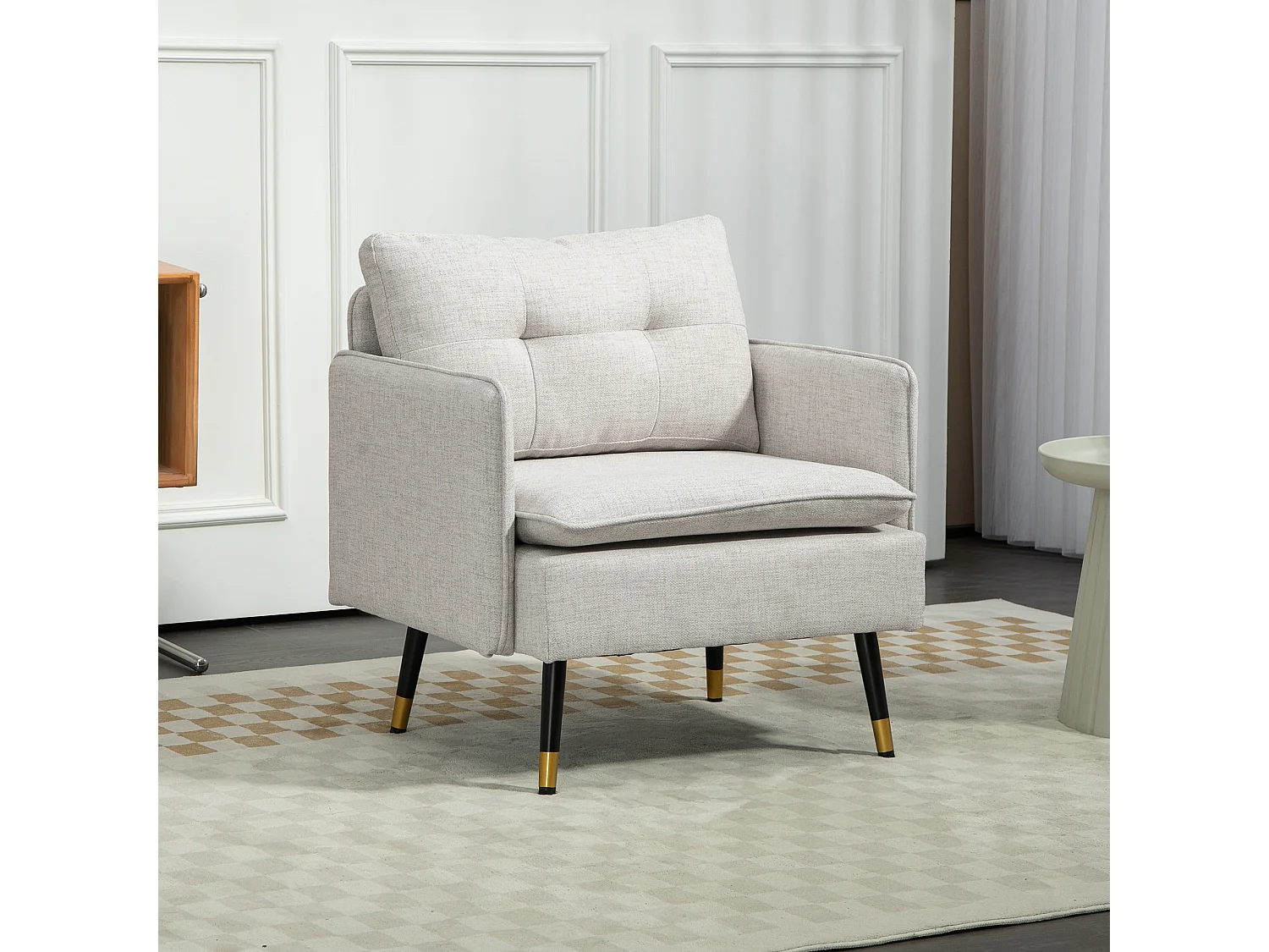 Fauteuil style art-déco dossier effet capitonné piètement incliné effilé métal noir extrémités dorées tissu blanc cassé