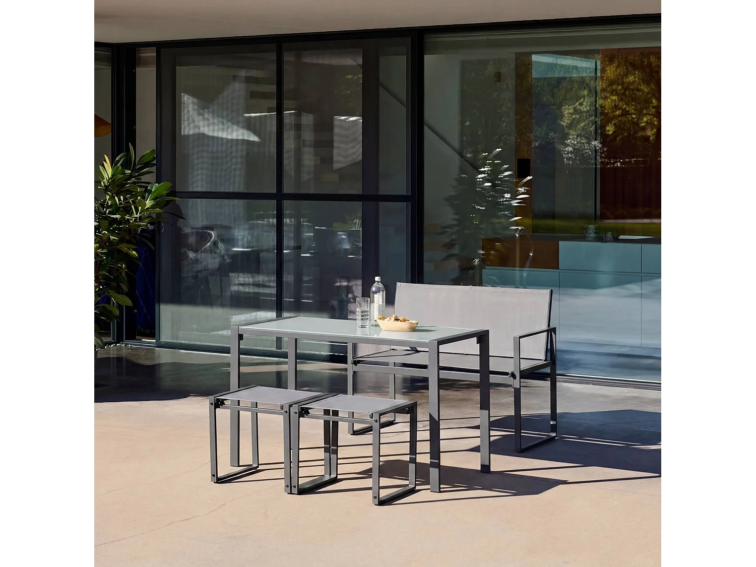 Set tavolo da giardino incastrabile in acciaio e textilene con 4