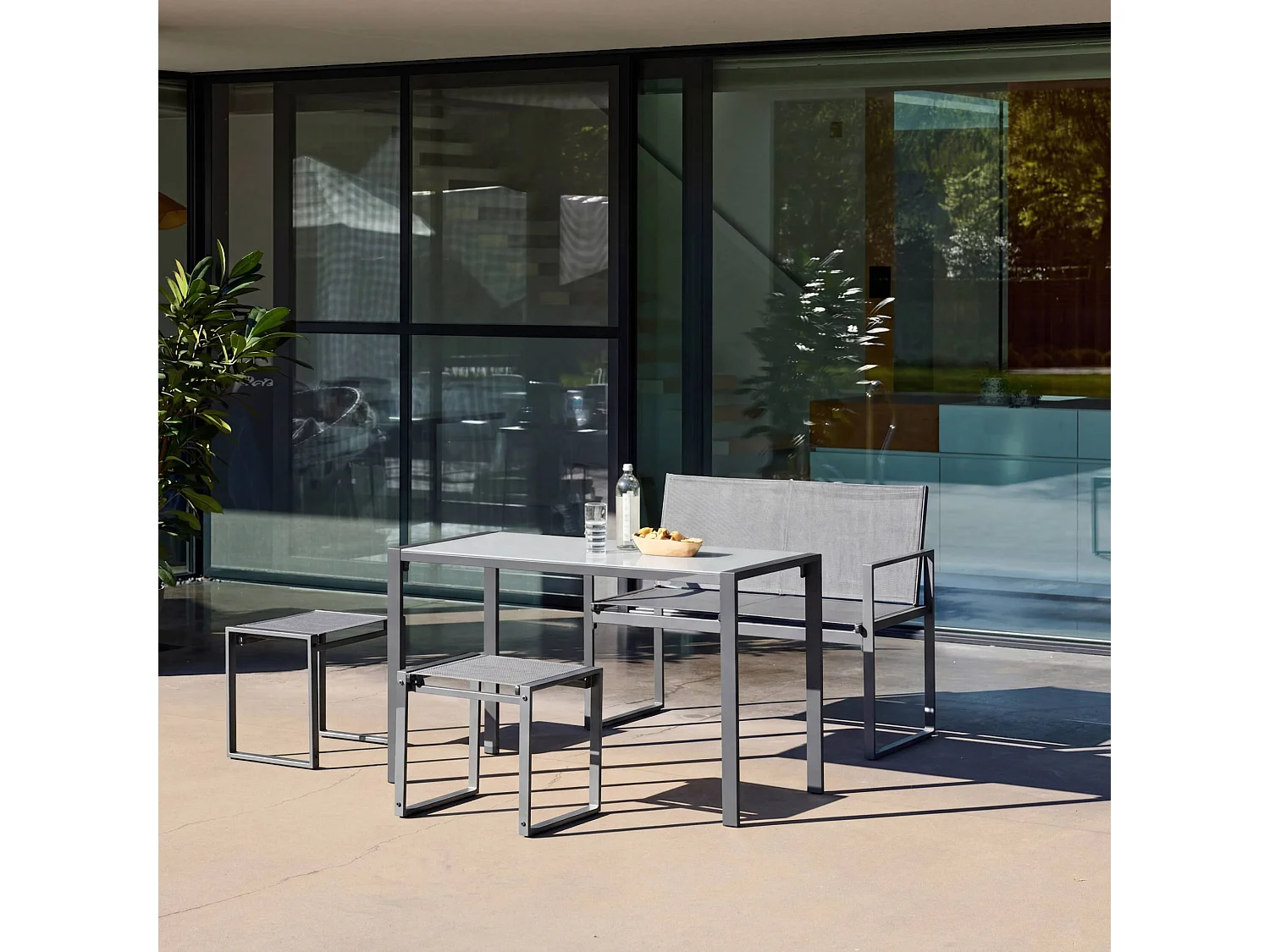 Set tavolo da giardino incastrabile in acciaio e textilene con 4