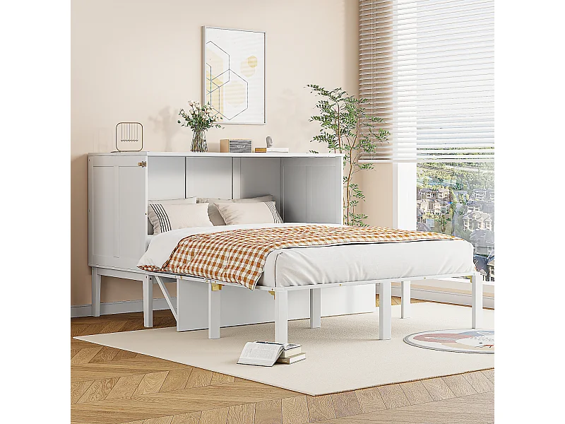 Cama abatible vertical blanca de 140x200 cm con somier de láminas integrado; una solución que ahorra espacio para la habitación de un adolescente o un estudio.