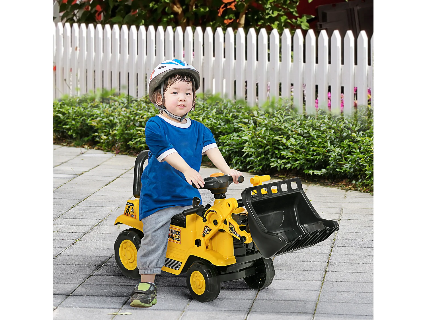 Escavatore per bambini con benna e spazio portaoggetti giallo e nero