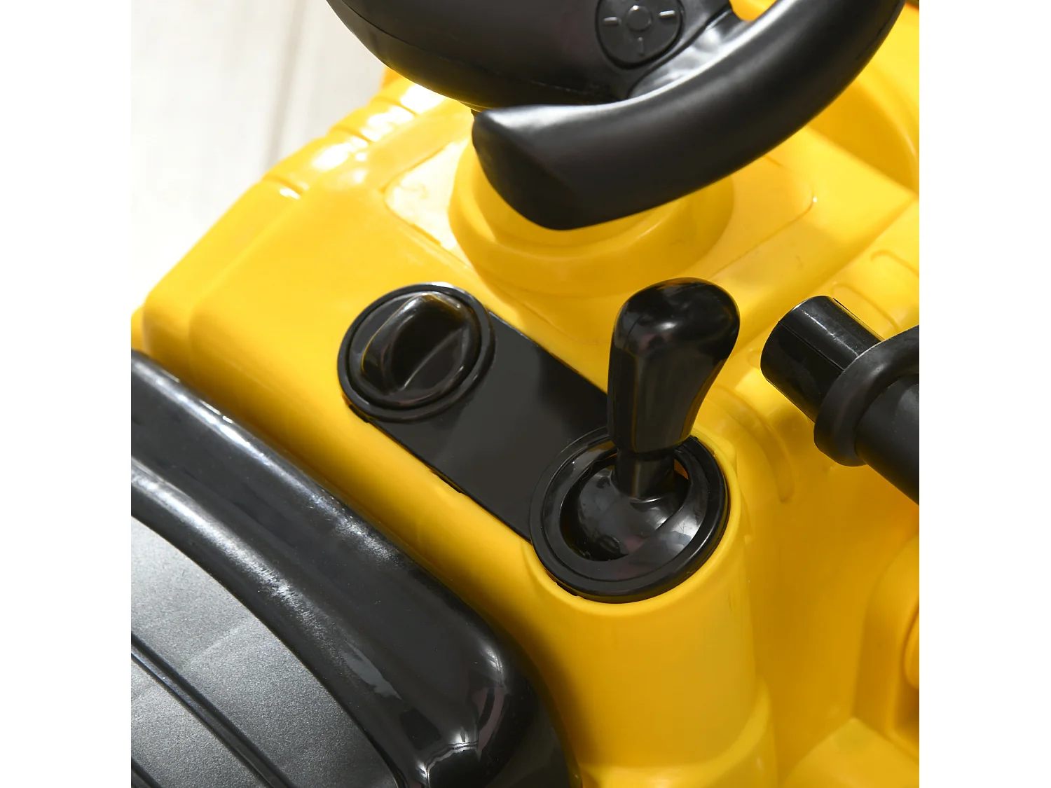 Escavatore per bambini con benna e spazio portaoggetti giallo e nero