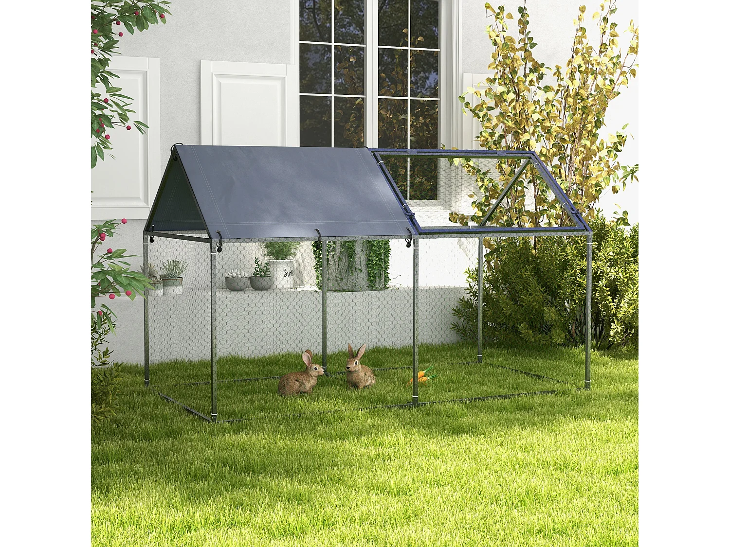 Gabbia per animali con picchetti e tetto verde e argento