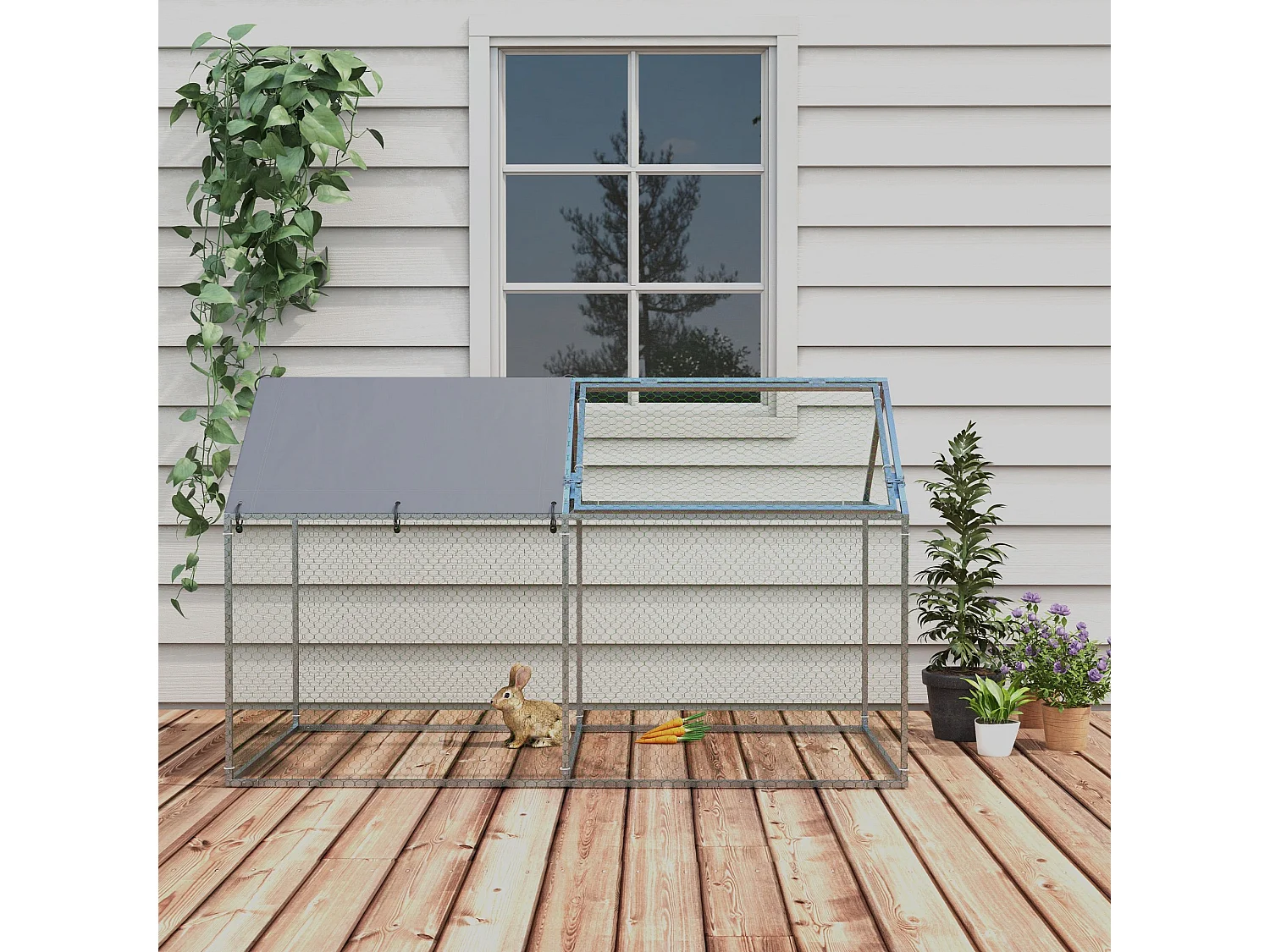 Gabbia per animali con picchetti e tetto verde e argento