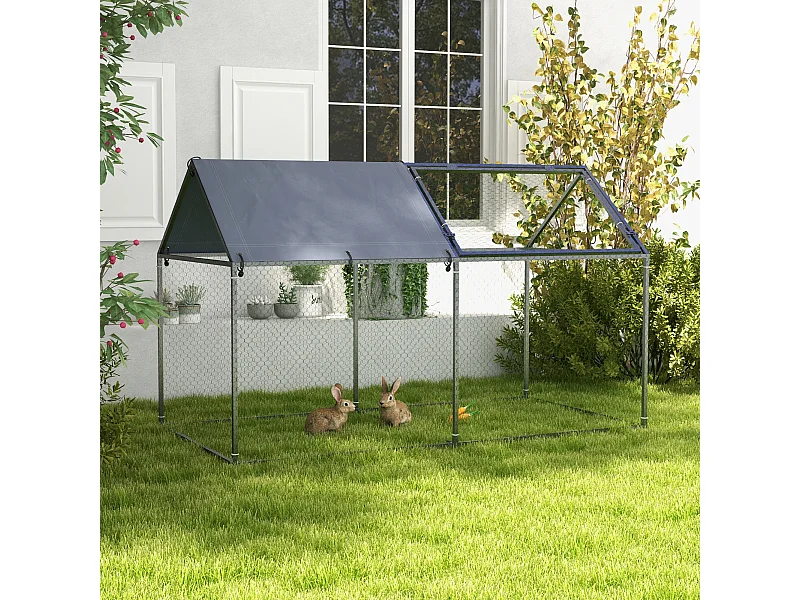 Gabbia per animali con picchetti e tetto verde e argento