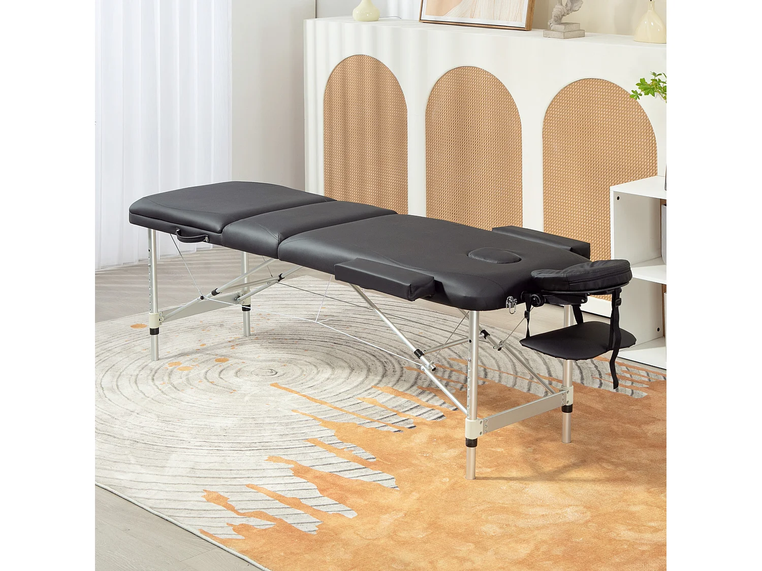 Lettino da massaggio pieghevole ad altezza regolabile nero
