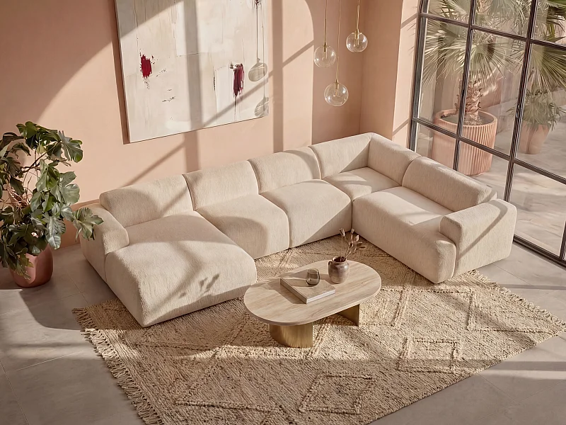 Grand canapé d'angle gauche panoramique en tissu bouclette blanc POGNI de Maison Céphy