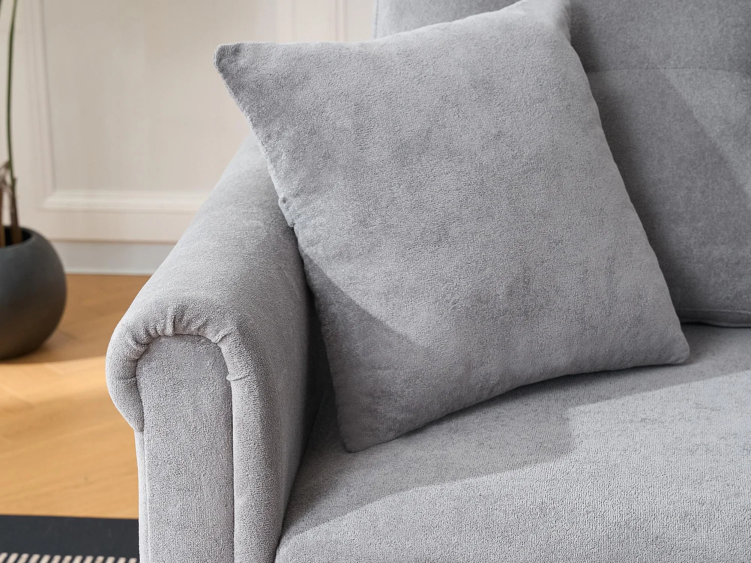 Canapé d'angle convertible 4 places avec coffre en tissu gris DÉLICE