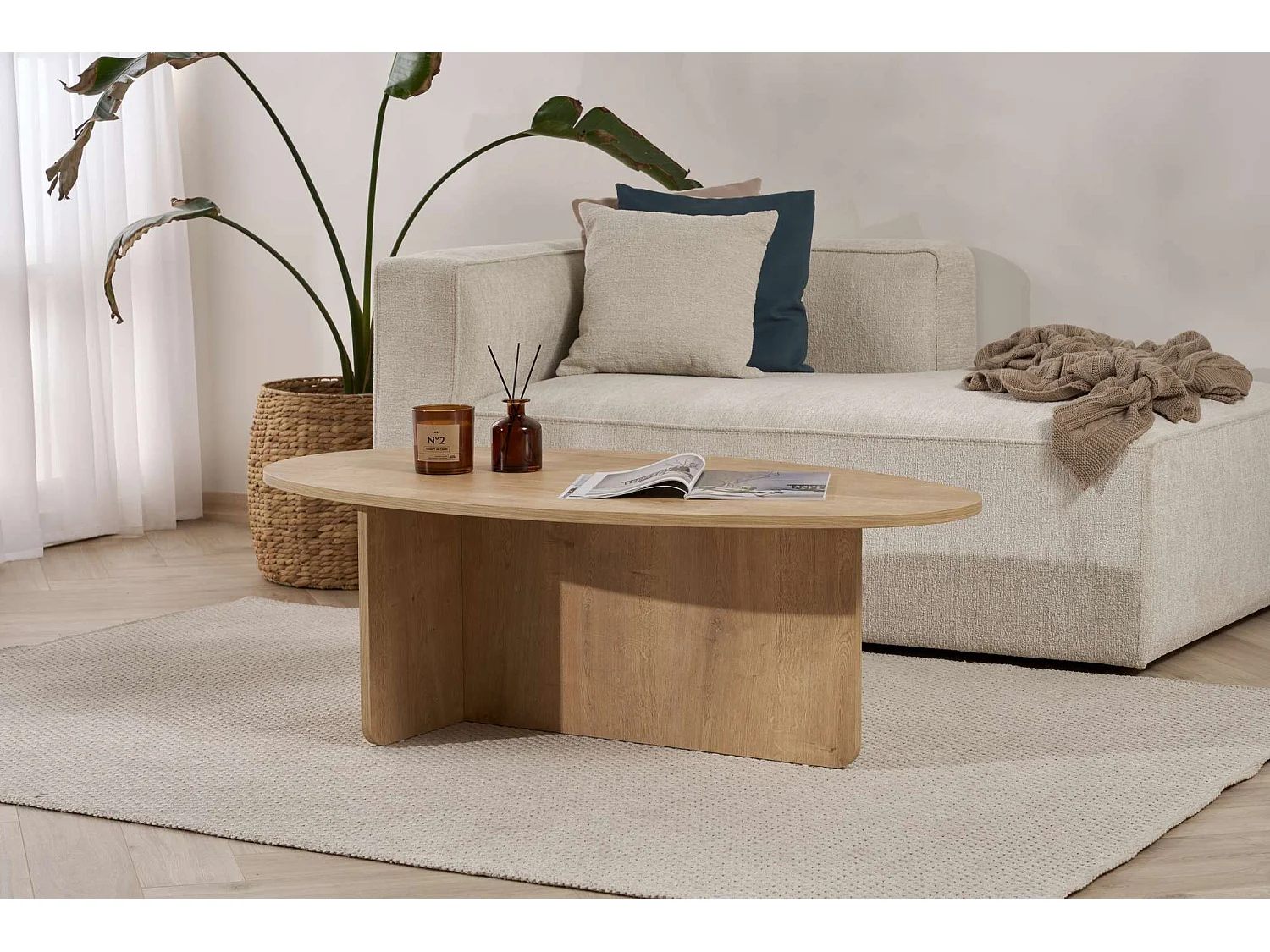 Table basse ovale en bois chêne "Orba" 120x65x40 cm, design épuré sans rangement