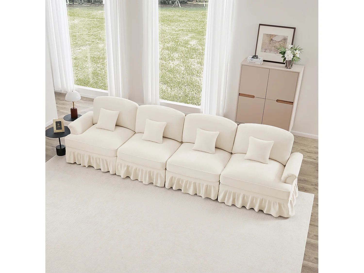 Canapé quatre places dossier segmenté coussin lombaire jambes fuselées Chenille blanc