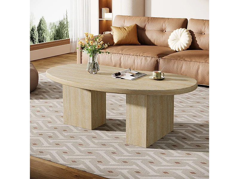 Owalny stolik kawowy do salonu, stolik centralny z asymetrycznymi nogami na cokole