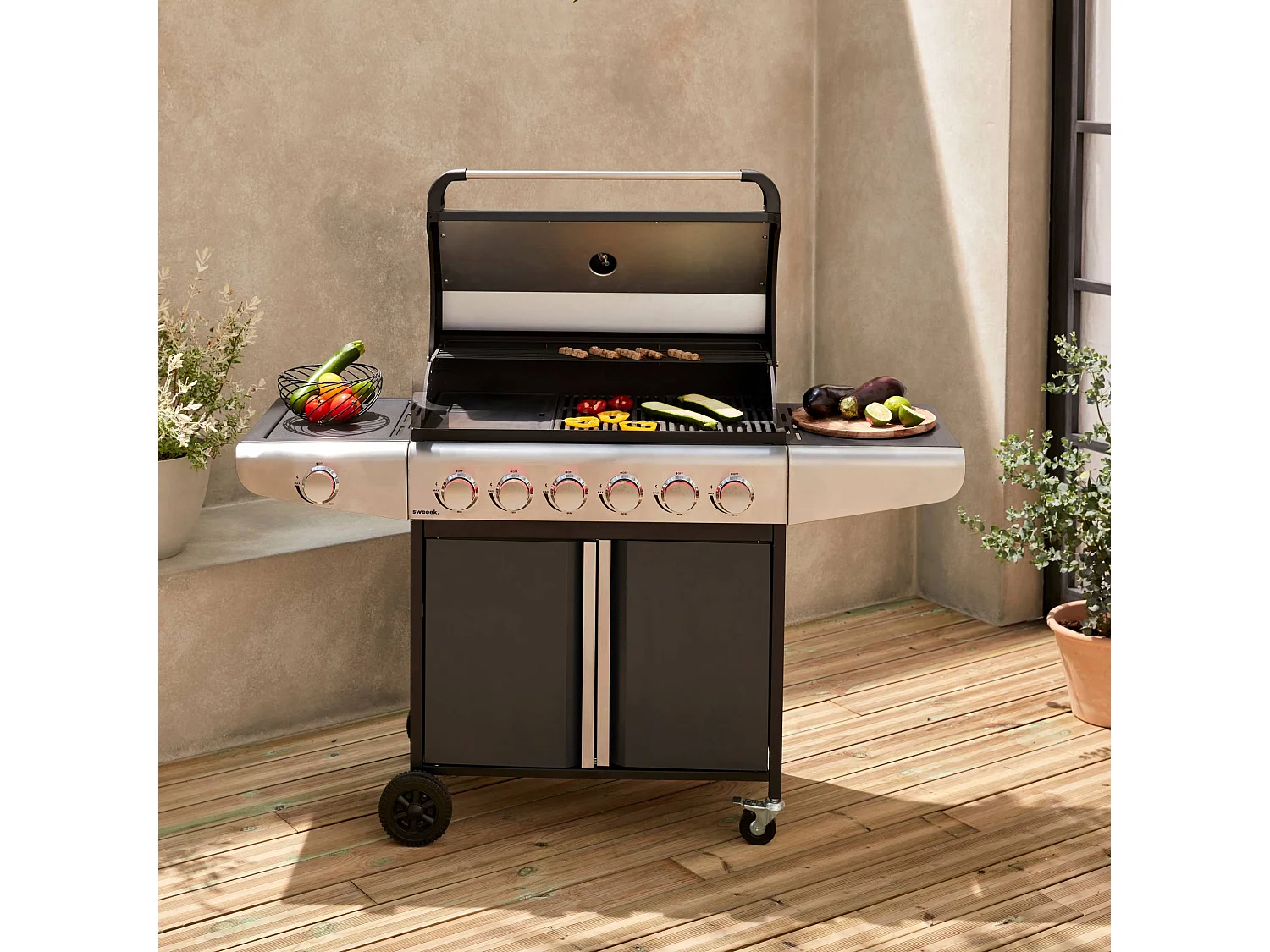 Barbecue au gaz - Bazin 6 Gris anthracite -  Cuisine extérieure 6 brûleurs dont 1 feu latéral avec tablettes et thermomètre. rangement. roues