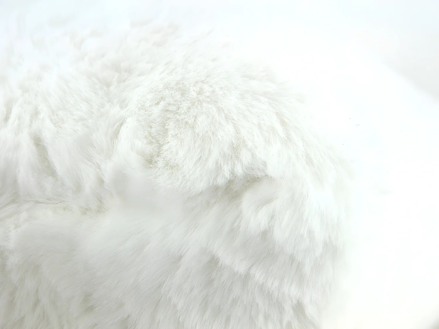 Coussin décoratif déhoussable en Fourrure Blanche 45 x 30 cm