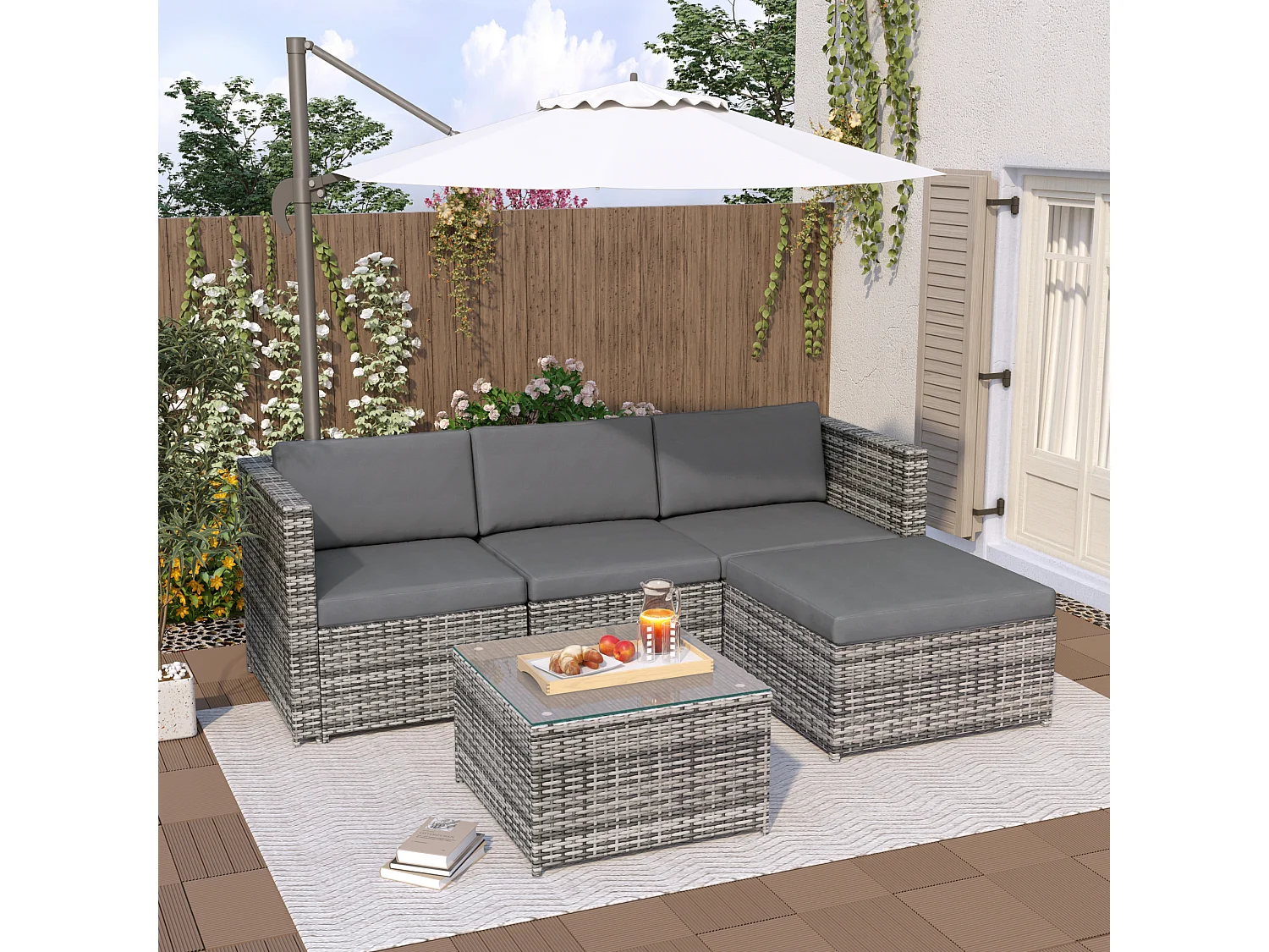 Salon de Jardin acier 4 places 1 table basse plateau en verre - coussin inclus - gris
