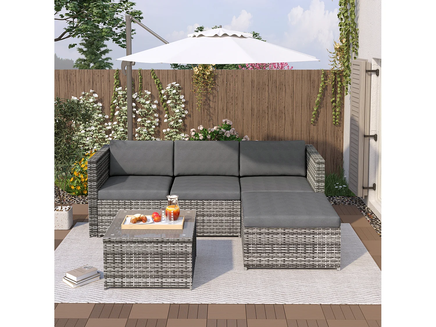 Salon de Jardin acier 4 places 1 table basse plateau en verre - coussin inclus - gris